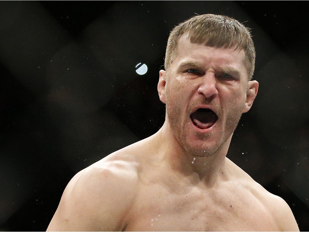 Stipe Miocic celebrates after defeating Andrei Arlovski in a heavyweight mixed martial arts bout at UFC 195 in Las Vegas