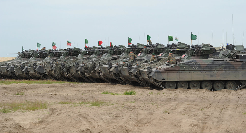 German army tanks line up during the course of the NATO Noble Jump exercise on a training range near Swietoszow Zagan Poland June 2015. The German military has seen an increase in deployments for exercises in Eastern Europe and on Russia's borders since