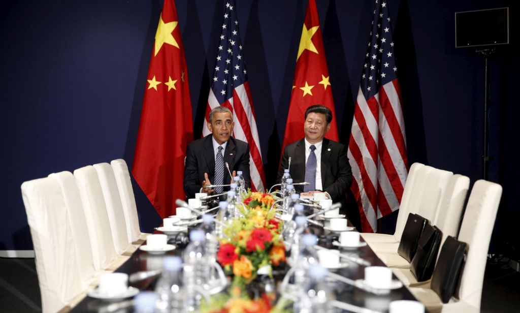 US President Barack Obama meets with Chinese President Xi Jinping at the start of the two-week climate summit in Paris