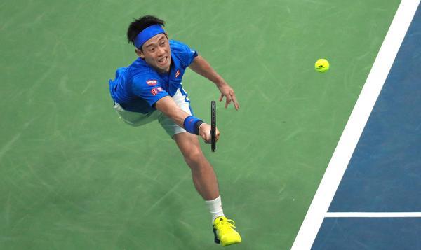 UPSET WIN:Kei Nishikori played with purpose to end the second seed and former champion Andy Murray’s campaign in the quarterfinals on Wednesday.— AFP