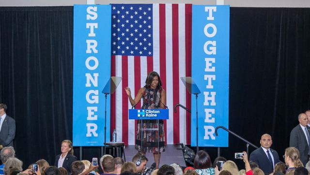 US First Lady Michelle Obama campaigns for Democratic presidential candidate Hillary Clinton at George Mason University on Friday