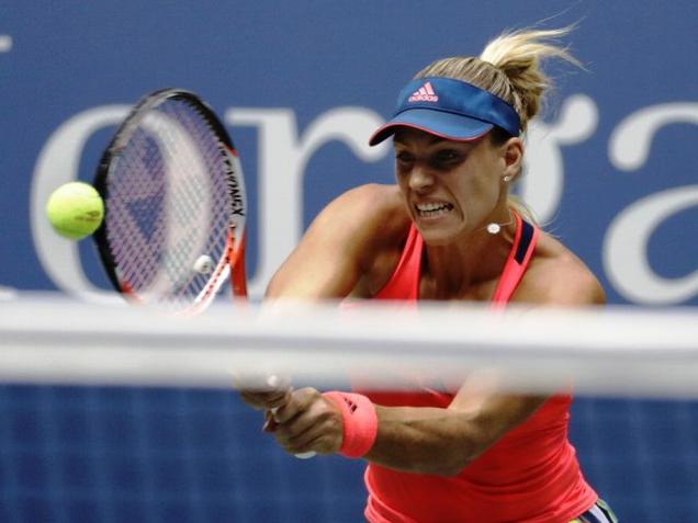 Germany's Angelique Kerber returns a shot to Italy's Roberta Vinci during the quarterfinals of the U.S. Open tennis tournament in New York on Tuesday