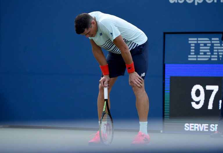 Milos Raonic of Canada pauses on court during his 2016 US Open 2016 Men's Singles match against Ryan Harrison of the US at the USTA Billie Jean King National Tennis Center in New York