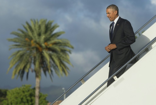 US President Barack Obama arrives at Joint Base Pearl Harbor- Hickam in Honolulu Hawaii