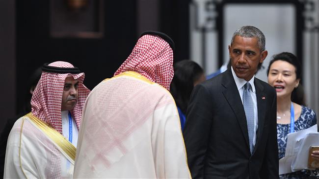 US President Barack Obama walks past Saudi delegates as he arrives for the G20 summit in Hangzhou China