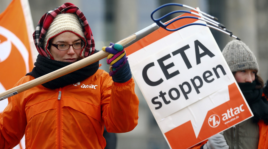 An activists from the anti-globalisation organisation ATTAC at the protest against planned trade pact CETA with Canada in Berlin