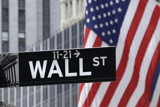 American flags fly at the New York Stock Exchange on Wall Street. Stocks fell in early trading in Europe on Friday Sept. 16 2016 led by banks as Deutsche Bank shares tumbled