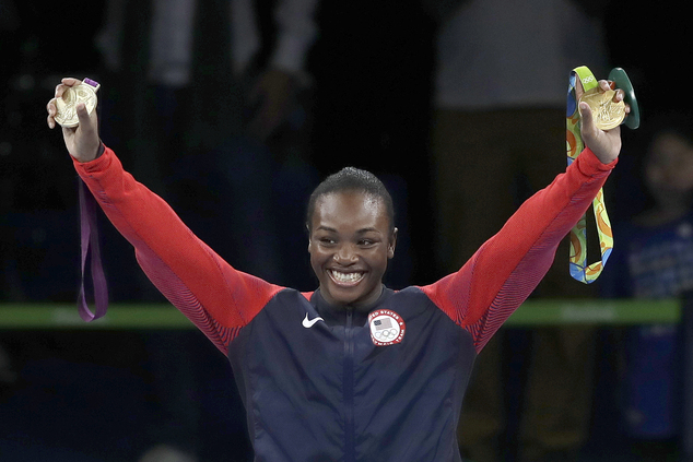 United States Claressa Maria Shields displays her gold medals- from London and from Rio- for the women's middleweight 75-kg boxing at the 2016 Summer Olym