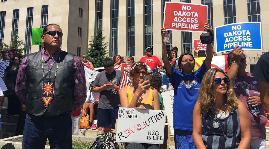 Demonstrators join members of North Dakota's Standing Rock Sioux Tribe to protest against construction of a Bakken shale pipeline they say would pollute water and desecrate sacred land in Washington DC