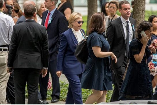 Democratic presidential candidate Hillary Clinton arrives to attend a ceremony at the National September 11 Memorial in New York Sunday Sept. 11 2016 on the 15th anniversary of the Sept. 11 attacks