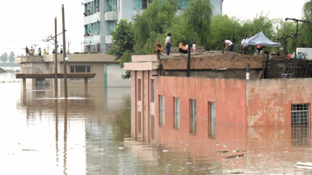 North Korea says floods damaged tens of thousands of buildings