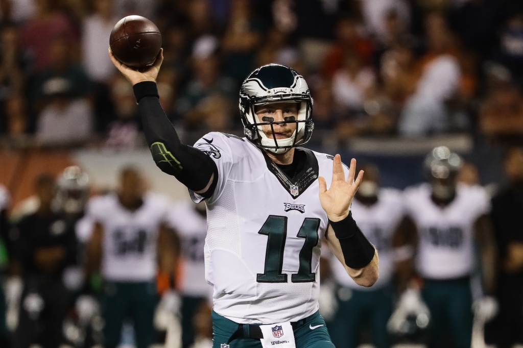 CHICAGO IL- SEPTEMBER 19 Quarterback Carson Wentz #11 of the Philadelphia Eagles looks to pass the football against the Chicago Bears in the first half at Soldier Field