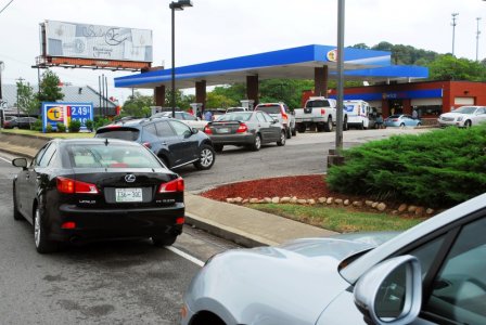 Vehicles wait in line for gas at a Twice Daily gas station on Franklin Road in Brentwood Tennessee