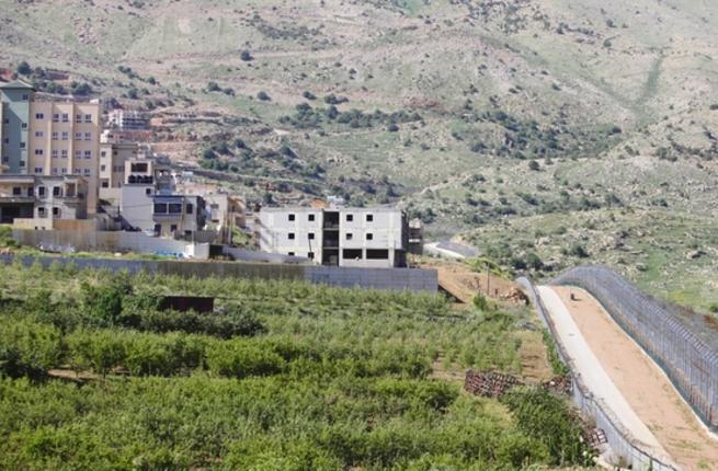 View from Israeli-occupied sector of Golan Heights shows border with Syria near village of Majdal Shmas