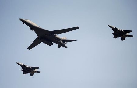 A U.S. Air Force B-1B bomber flies over Osan Air Base in Pyeongtaek