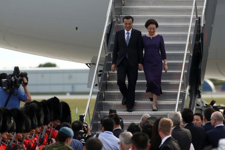 Chinese Premier Li Keqiang and his wife Cheng Hong arrive at the Ottawa Macdonald–Cartier International Airport in Ottawa CanadaMore