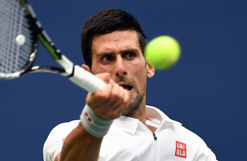 Novak Djokovic hits a return against Gael Monfils during their 2016 US Open semifinal match