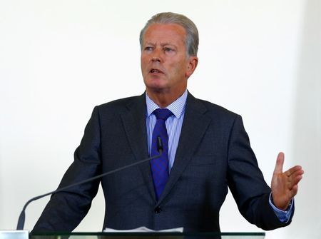 Austrian acting Chancellor Mitterlehner addresses a news conference in Vienna