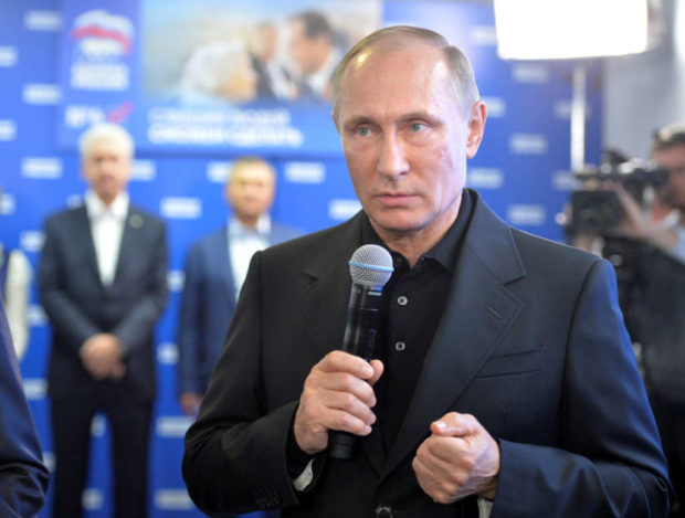 Russian President Vladimir Putin speaks at the United Russia party's campaign headquarters following a parliamentary election in Moscow Russia