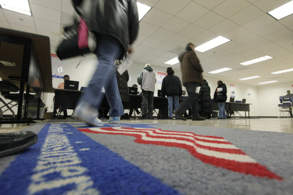 Voters arrive to cast their ballots during early voting in 2012