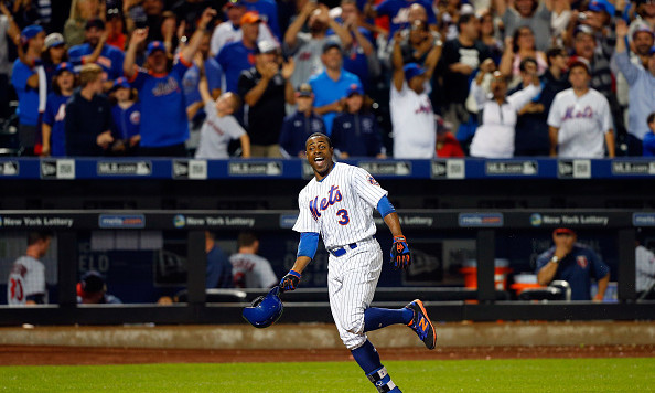 NEW YORK NY- SEPTEMBER 17 Curtis Granderson #3 of the New York Mets celebrates his twelfth inning game winning home run against the Minnesota Twins at Citi Field