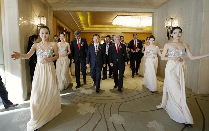 Wang Jianlin, chairman of Dalian Wanda Group arrives for a signing ceremony in Beijing