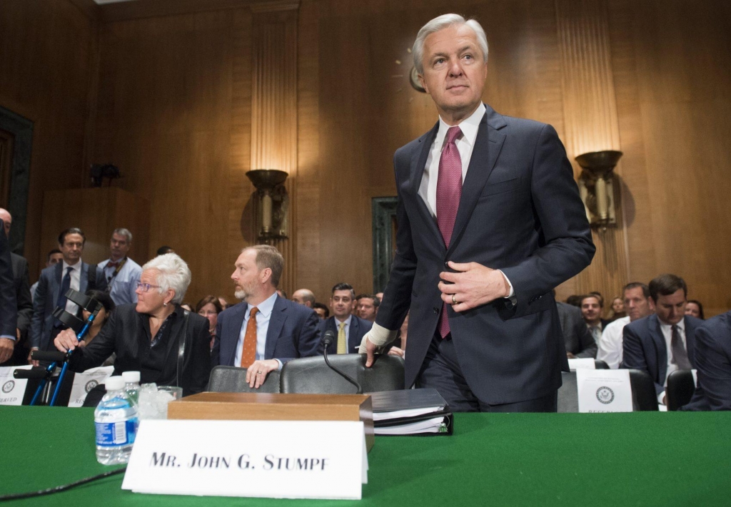 John Stumpf chairman and CEO of Wells Fargo arrives to testify about the unauthorized opening of accounts by Wells Fargo during a Senate Banking Housing and Urban Affairs Committee hearing on Capitol Hill in Washington D.C. Sept. 20 2016. (Saul Loeb