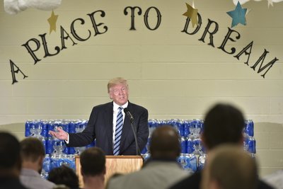 Watch This Black Pastor Shut Down Donald Trump During A Flint Campaign Speech