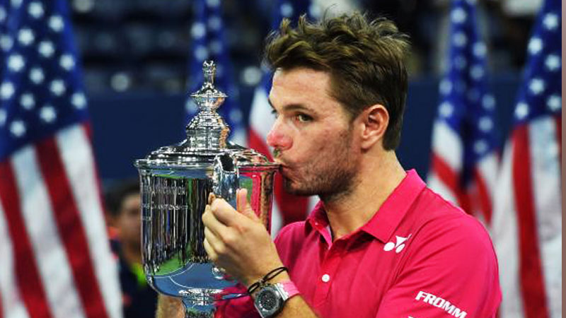 Stan Wawrinka of Switzerland celebrates after the men