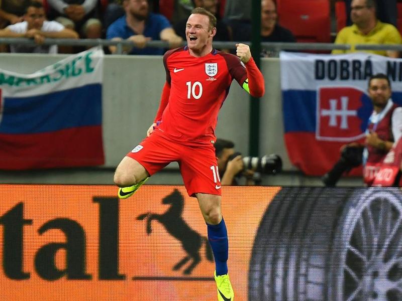 Wayne Rooney celebrates for England