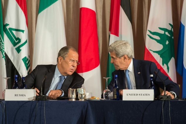 Russian Foreign Minister Sergei Lavrov and United States Secretary of State John Kerry speak during the International Syria Support Group meeting September