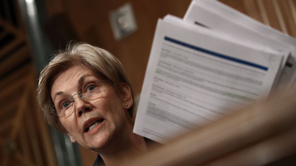 Se. Elizabeth Warren questions John Stumpf chairman and CEO of the Wells Fargo & Company during a hearing of the Senate Banking Housing and Urban Affairs Committee