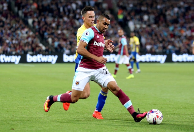 West Ham United's Dimitri Payet and Accrington Stanley's John O'Sullivan battle for the ball during the EFL Cup Third Round match at London Stadium