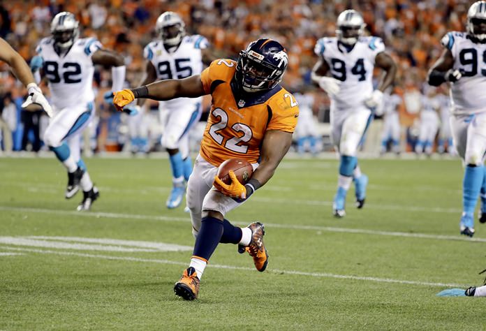 Denver Broncos running back C.J. Anderson runs in for a touchdown against the Carolina Panthers during the second half of an NFL football game Thursday Sept. 8 in Denver