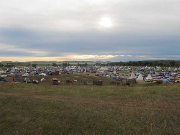 More than a thousand people gather at an encampment near North Dakota's Standing Rock Sioux reservation on Friday Sept. 9 2016. The Standing Rock Sioux tri