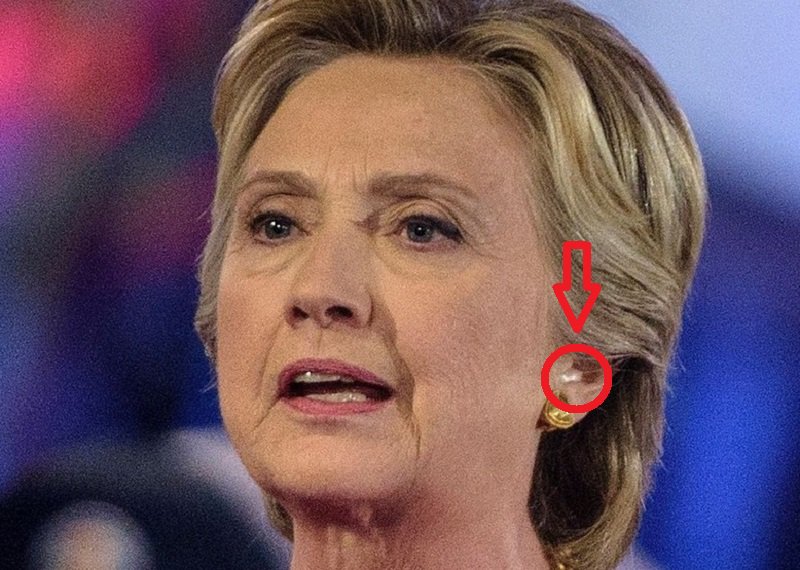 Who Is Talking Into Hillary’s Earpiece