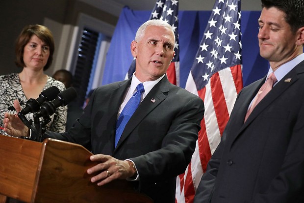 U.S. Republican vice presidental nominee Gov. Mike Pence answers reporters questions during a news conference with Speaker of the House Paul Ryan  and Rep. Cathy Mc Morris Rodgers  following a weekly House GOP conference at the Rep