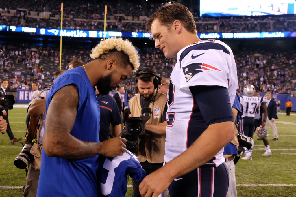 Sep 1 2016 East Rutherford NJ USA New York Giants wide receiver Odell Beckham signs his jersey for New England Patriots quarterback Tom Brady after the Giants 17-9 victory over the Patriots at Met Life Stadium. Mandatory Credit Ed Mulholl