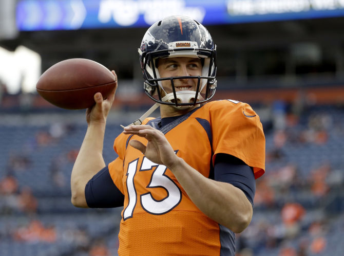 Denver Broncos quarterback Trevor Siemian warms up prior to an NFL preseason football game against the Los Angeles Rams in Denver. Offseason workouts training camp and preseason games are supposed to supply