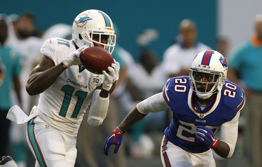 Sep 27 2015 Miami Gardens FL USA Miami Dolphins wide receiver De Vante Parker catches as Buffalo Bills safety Corey Graham moves in at Sun Life Stadium where Buffalo defeated the Dolphins 41-14. Mandatory Credit Andrew Innerarity-USA TODAY