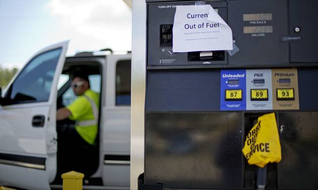 A sign informs customers of a gas outage at a station in Smyrna Ga. Monday Sept. 19 2016. Gas prices spiked and drivers found'out of service bags covering pumps as the gas shortage in the South rolled into the work week raising fears that the disru