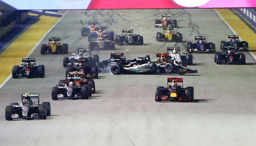 Force India driver Nico Hulkenberg of Germany loses control of his car after a collision at the start of the Singapore Formula One Grand Prix on the Marina Bay City Circuit Singapore Sunday Sept. 18 2016