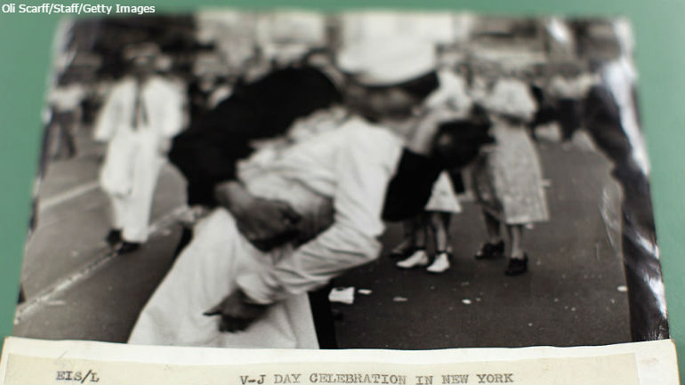 LONDON ENGLAND- MAY 13 A black and white print of a couple kissing in Times Square on VJ Day taken by Alfred Eisenstaedt is laid out from the vast collection of historic