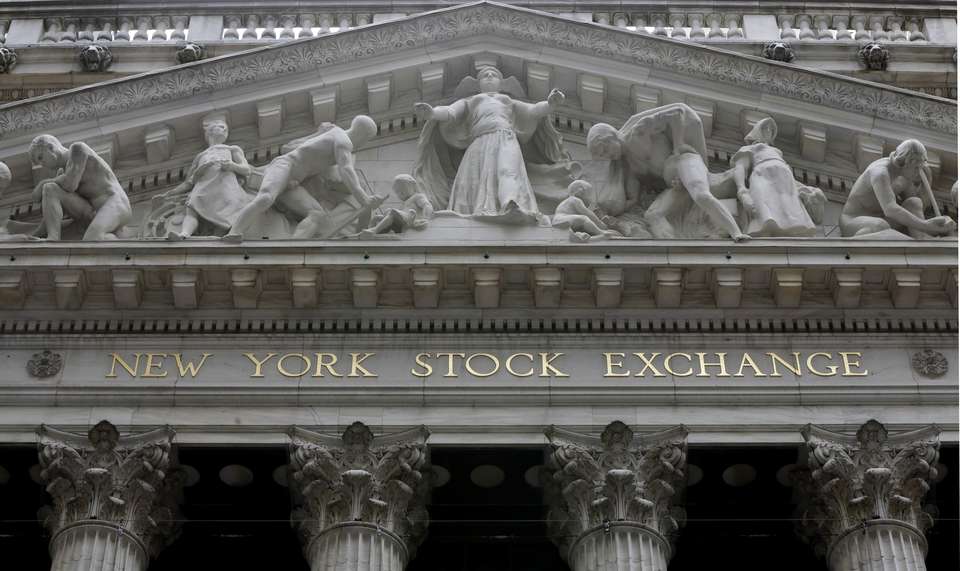 Stocks skid as weaker forecast sends oil prices lower