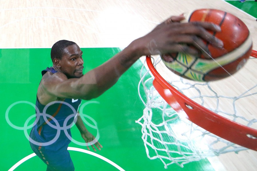 RIO DE JANEIRO Aug. 21 2016 Kevin Durant of the United States of America dunks during the men's gold medal game of Basketball against Serbia at the 2016 Rio Olympic Games in Rio de Janeiro Brazil on Aug. 21 2016. The U.S. team won the gold medal