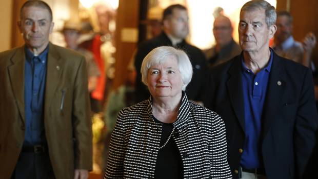 Fed chair Janet Yellen arrives for a reception on the opening night of the annual meeting of the world's central bankers at Jackson Lake Lodge Wyoming