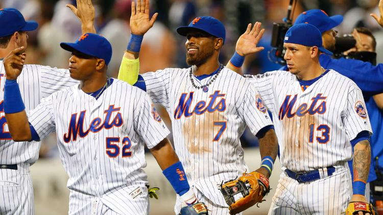 Yoenis Cespedes, Jose Reyes and Asdrubal Cabrera celebrate a win at Citi Field. Mandatory Credit Noah K. Murray-USA TODAY Sports