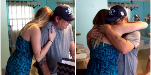 Gabriella Lynde hugs her stepfather after she surprises him with adoption papers for his birthday in emotional video posted on YouTube