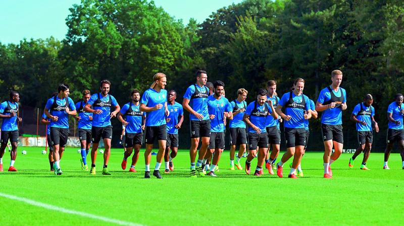 FC Basel players warm up during a training session in Basel Switzerland on Monday eve of their UEFA Champions League Group ‘A’ football match against PFC Ludogorets Razgrad