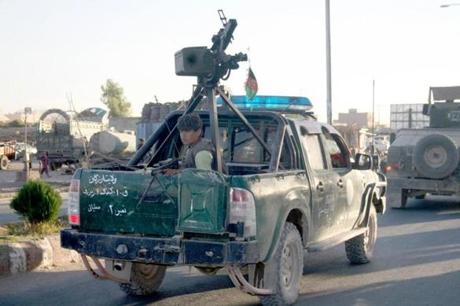 Afghan police were reportedly being fired on Thursday by Taliban in Tirin Kot